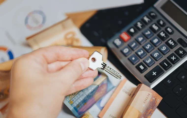 مستندات مالية وآلة حاسبة لقضايا تحصيل الديون التجارية المستعصية بالرياض